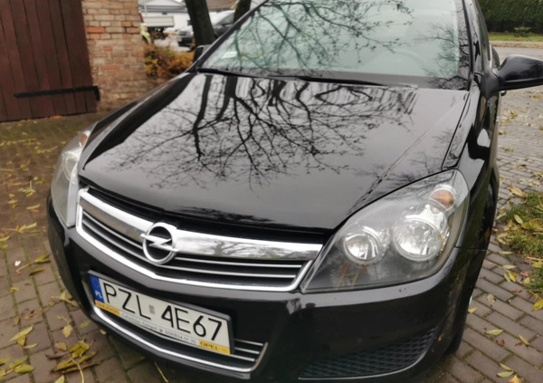 Opel Astra cena 17500 przebieg: 243080, rok produkcji 2011 z Ostróda małe 704